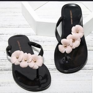Black jelly flip-flops